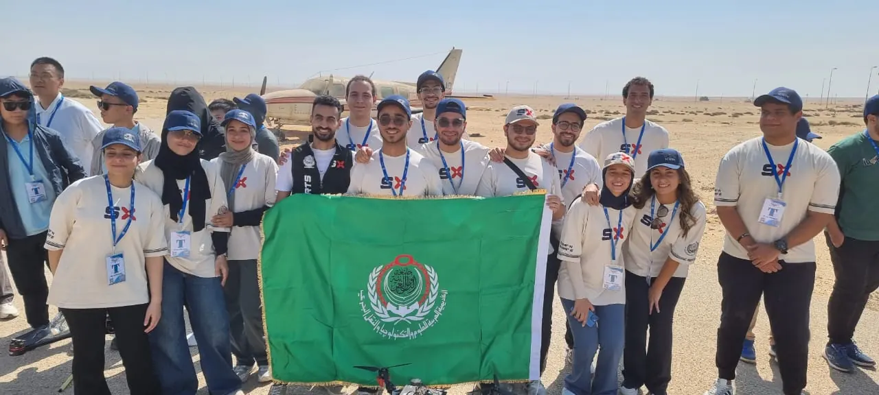 The team with the AAST flag at ICMTC 2025